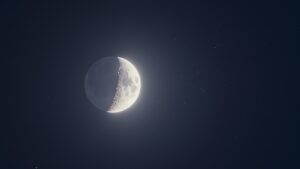 The moon shines with a swarm of stars on May 21 as Jupiter, Venus and Mercury line up nearby