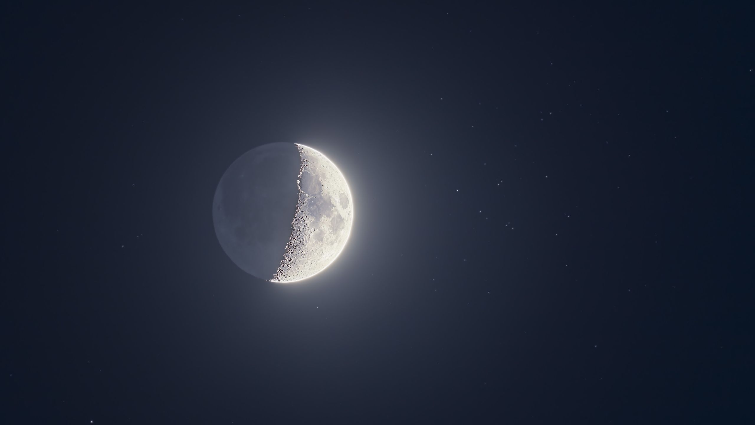 The moon shines with a swarm of stars on May 21 as Jupiter, Venus and Mercury line up nearby